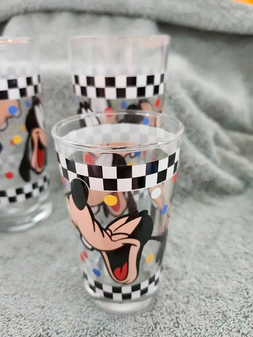 This is a set of vintage Goofy drinking glasses manufactured by Anchor Hocking f